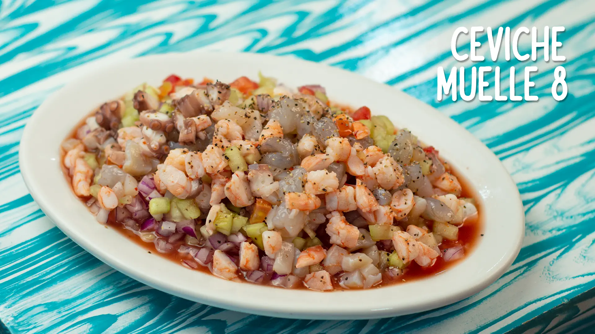 Ceviche Muelle 8 — camarón, pulpo y caracol en salsa de la casa